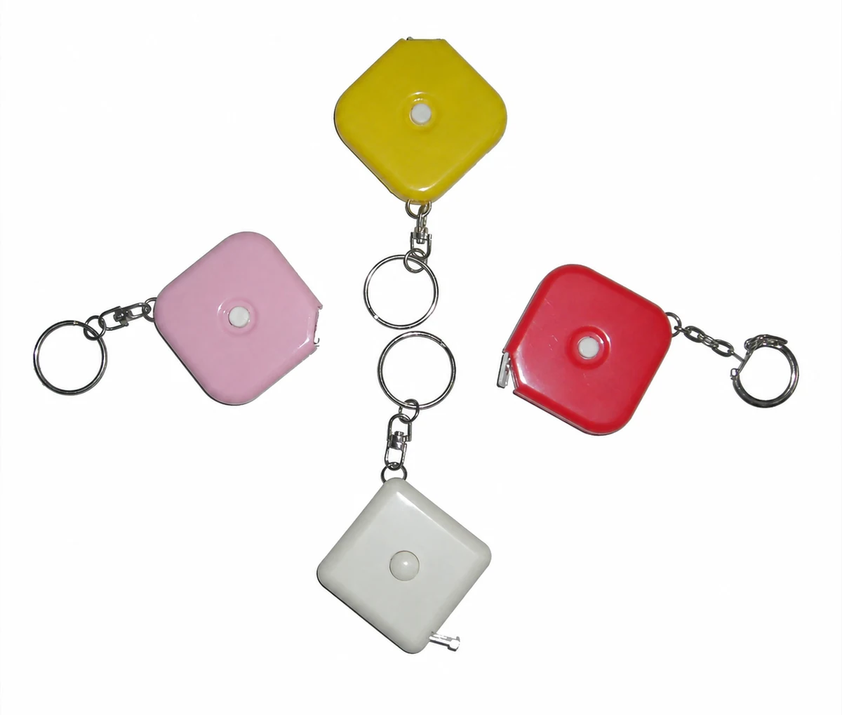 Four complete unbranded keychain tape measure housings with clips, rings and visible tape formats