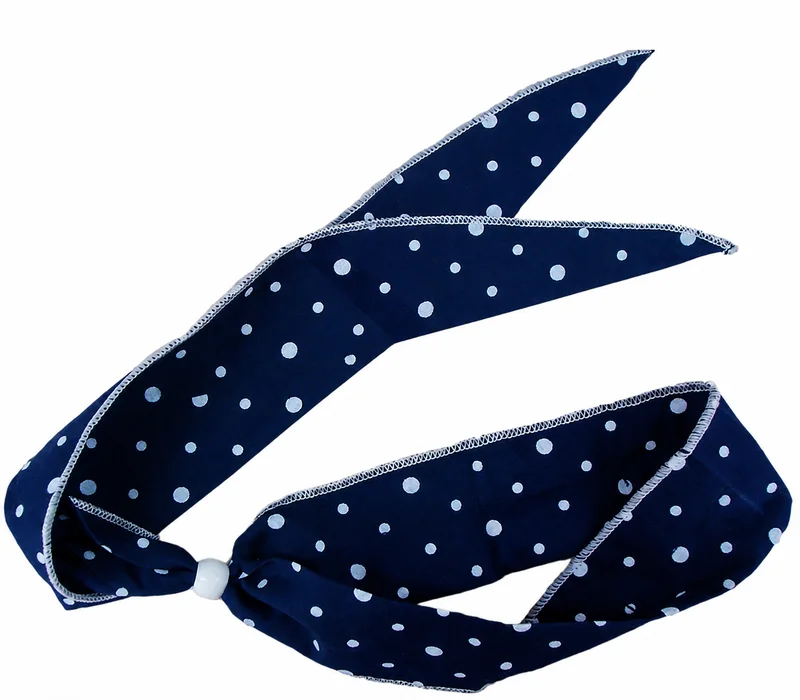 Complete navy polka-dot cooling collar showing the curved profile, fabric edge and compartment layout