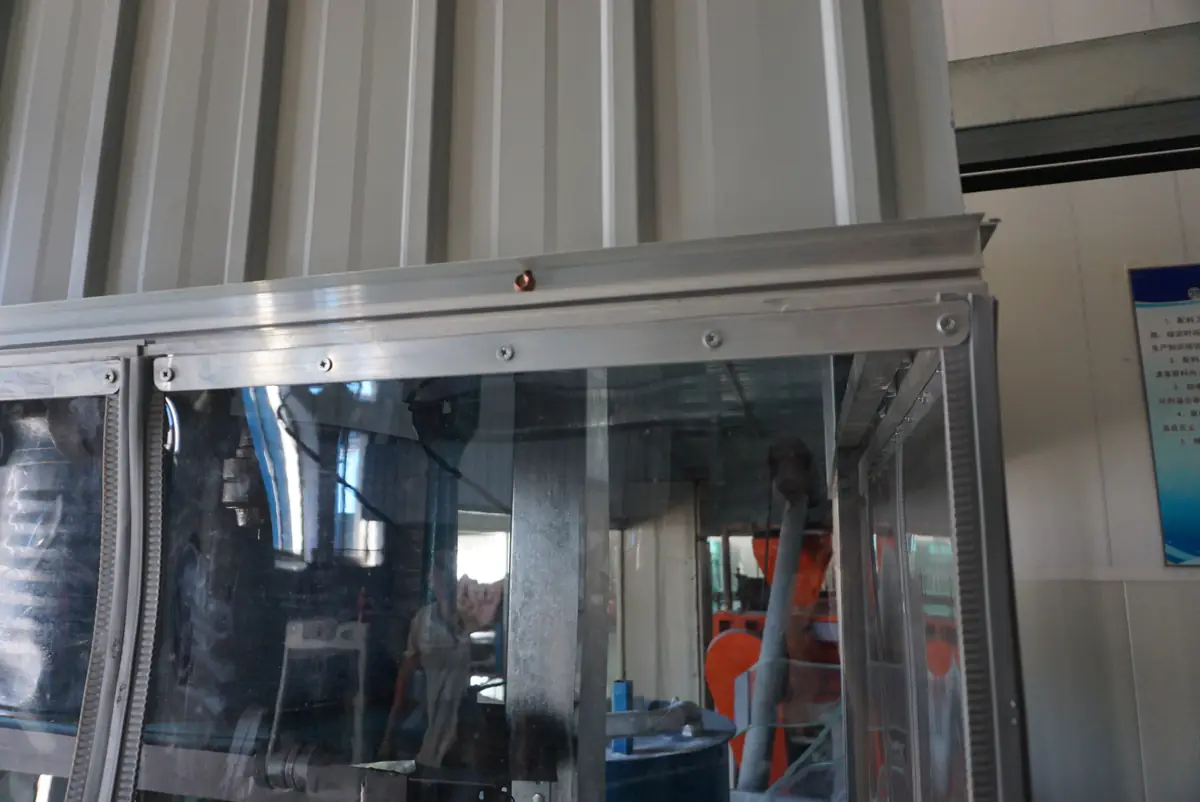 Upper magnetic doorway header and transparent panel interface.