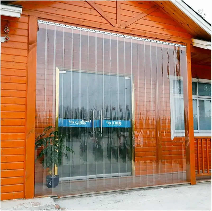 Clear PVC strip curtain installation showing effective environmental barrier